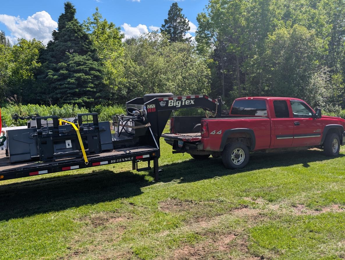 SMD88 subsoil mulcher attachment on trailer with Clearline Land truck